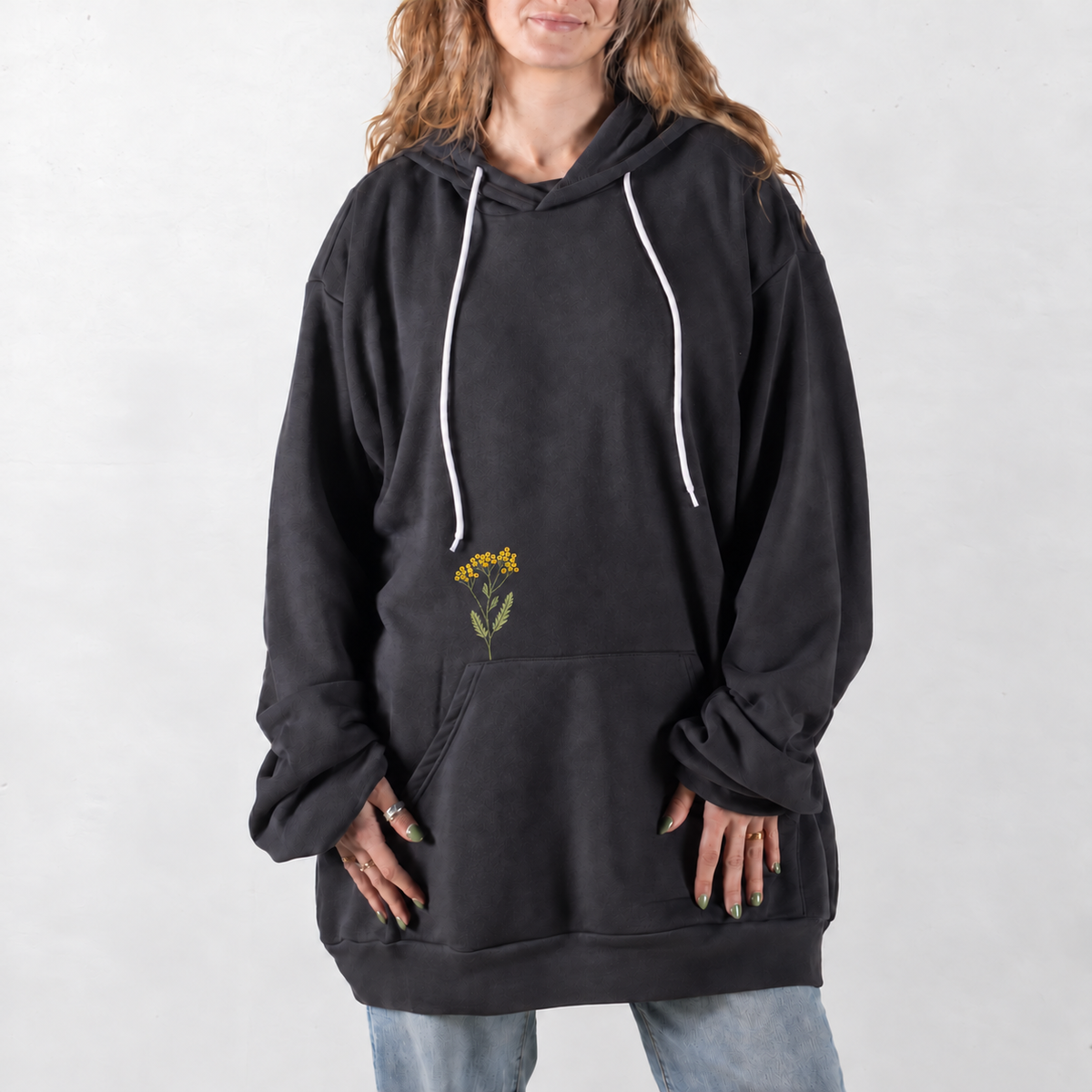 Dark Gray Yellow Tansy Embroidered Giant Hoodie with small floral embroidery above the pocket seam